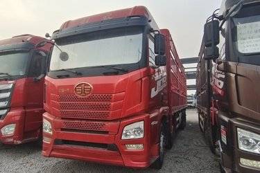 二手青岛解放 JH6重卡 460马力 8X4 9.5米仓栅式载货车(国五) 前四后八 潍柴二手载货车 黄牌图片