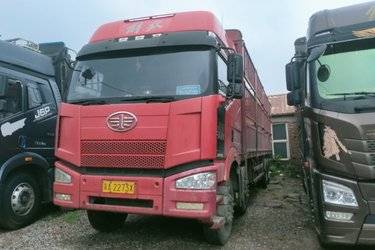 二手一汽解放 J6P重卡 350马力 8X4 9.5米仓栅式载货车(国四) 前四后八 锡柴二手载货车 黄牌图片
