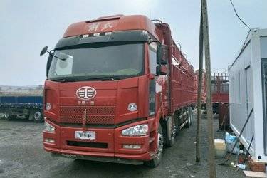 二手一汽解放 J6P重卡 350马力 8X4 9.5米仓栅式载货车(国五) 前四后八 锡柴二手载货车 黄牌图片