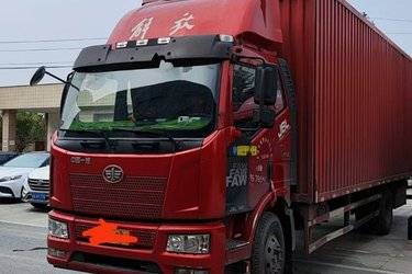 二手一汽解放 J6L中卡 180马力 7.7米翼开启厢式载货车(国五) 单桥 锡柴二手载货车 黄牌图片