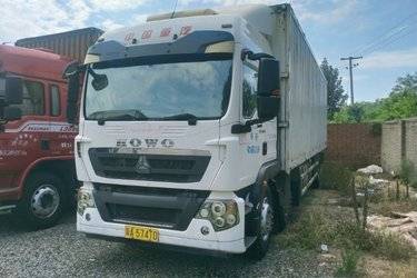 二手中国重汽 HOWO TX重卡 320马力 6X2 9.6米栏板载货车(国五) 前四后四 曼二手载货车 黄牌图片