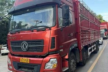 二手东风商用车 天龙重卡 385马力 8X4 9.6米仓栅式载货车(国五) 前四后八 东风二手载货车 黄牌图片