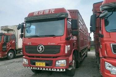 二手陕汽重卡 德龙L3000 300马力 6X2 9.7米仓栅式载货车(国五) 前四后四 玉柴二手载货车 黄牌图片