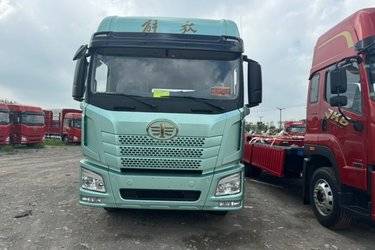 二手青岛解放 JH6 320马力 6.2米栏板载货车(国六) 单桥 锡柴二手载货车 黄牌图片
