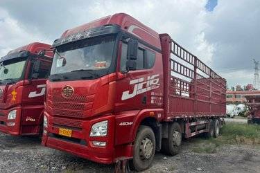 二手青岛解放 JH6重卡 460马力 8X4 9.4米仓栅式载货车(国五) 前四后八 潍柴二手载货车 黄牌图片