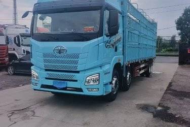 二手青岛解放 JH6 智享版 350马力 6X2 9.5米仓栅式载货车(国六) 前四后四 锡柴二手载货车 黄牌图片
