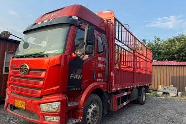 二手一汽解放 J6L中卡 精英版 240马力 4X2 6.75米仓栅式载货车(国五) 单桥 锡柴二手载货车 黄牌图片