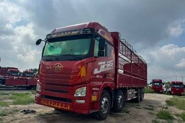 二手青岛解放 JH6重卡 领航版2.0 460马力 8X4 9.4米仓栅式载货车(国六) 前四后八 锡柴二手载货车 黄牌图片