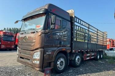 二手青岛解放 JH6 智享版 520马力 8X4 9.5米AMT自动档仓栅式载货车(国六) 前四后八 锡柴二手载货车 黄牌图片