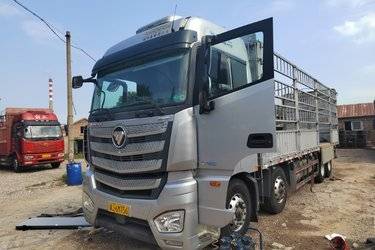 二手福田 欧曼EST 穿越版 490马力 8X4 9.56米AMT自动挡仓栅式载货车(国六) 前四后八 福田康明斯二手载货车 黄牌图片