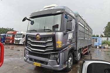 二手中国重汽 HOWO MAX 510马力 8X4 9.5米AMT自动挡仓栅式载货车(国六) 前四后八 曼二手载货车 黄牌图片