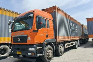 二手中国重汽 汕德卡SITRAK C5H重卡 340马力 8X4 9.52米厢式载货车(国五) 前四后八 曼二手载货车 黄牌图片