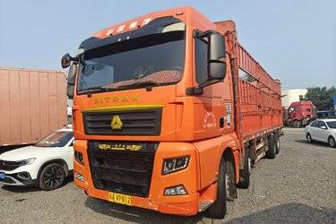 二手中国重汽 汕德卡SITRAK G7重卡 440马力 8X4 9.6米仓栅式载货车(国五) 前四后八 曼二手载货车 黄牌