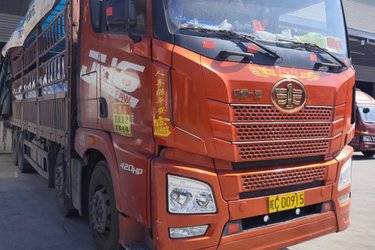 二手青岛解放 JH6重卡 420马力 8X4 9.5米仓栅式载货车(国五) 前四后八 锡柴二手载货车 黄牌