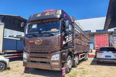 二手青岛解放 JH6重卡 领航版2.0 460马力 8X4 9.4米仓栅式载货车(后桥457升级冲焊桥)(国五) 前四后八 锡柴二手载货车 黄牌