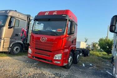 二手青岛解放 JH6重卡 领航版 350马力 6X2 9.5米AMT自动档仓栅式载货车(国六) 前四后四 锡柴二手载货车 黄牌