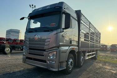 二手青岛解放 JH6 智享版 350马力 6X2 9.5米AMT自动档仓栅式载货车(国六) 前四后四 锡柴二手载货车 黄牌
