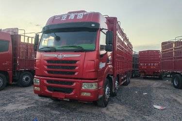 二手青岛解放 途V重卡 350马力 8X4 9.5米仓栅式载货车(国五) 前四后八 锡柴二手载货车 黄牌