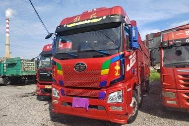 二手青岛解放 JH6重卡 350马力 8X4 9.4米仓栅式载货车(国五) 前四后八 锡柴二手载货车 黄牌