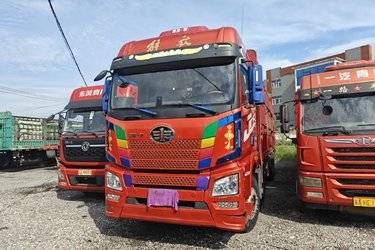 二手青岛解放 JH6重卡 350马力 8X4 9.5米仓栅式载货车(国五) 前四后八 锡柴二手载货车 黄牌