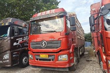二手陕汽重卡 德龙新M3000 430马力 8X4 9.55米仓栅式载货车(国五) 前四后八 潍柴二手载货车 黄牌