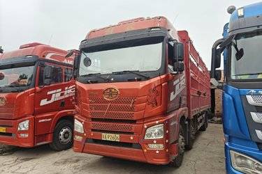 二手青岛解放 JH6重卡 领航版2.0 420马力 8X4 9.5米仓栅式载货车(国五) 前四后八 锡柴二手载货车 黄牌