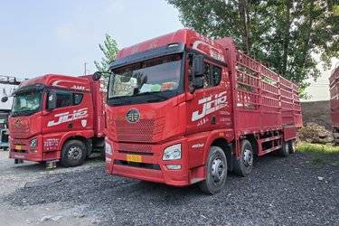 二手青岛解放 JH6重卡 领航版2.0 460马力 8X4 9.4米仓栅式载货车(国五) 前四后八 潍柴二手载货车 黄牌