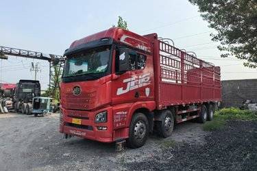 二手青岛解放 JH6重卡 460马力 8X4 9.5米仓栅式载货车(自动挡)(国五) 前四后八 潍柴二手载货车 黄牌