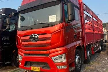 二手一汽解放 J7重卡 460马力 8X4 9.4米仓栅式载货车(国六) 前四后八 锡柴二手载货车 黄牌