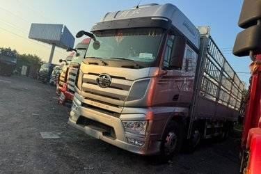 二手一汽解放 J7重卡 经典版 460马力 8X4 9.4米仓栅式载货车(国六) 前四后八 锡柴二手载货车 黄牌图片