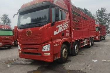 二手青岛解放 JH6重卡 350马力 8X4 9.5米仓栅式载货车(国五) 前四后八 锡柴二手载货车 黄牌