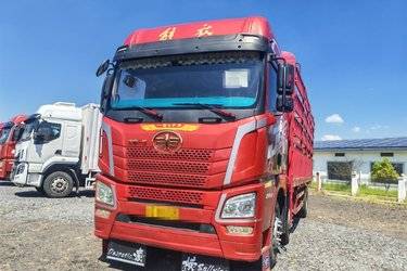 二手青岛解放 JH6重卡 领航版2.0 290马力 6X2 7.7米仓栅式载货车(国五) 前四后四 锡柴二手载货车 黄牌