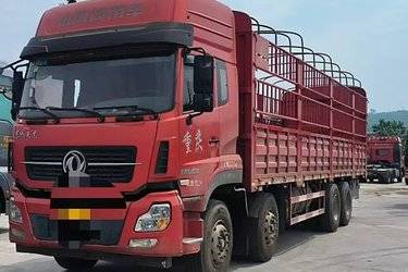 二手东风商用车 天龙重卡 350马力 8X4 9.4米仓栅式载货车(国五) 前四后八 东风二手载货车 黄牌图片