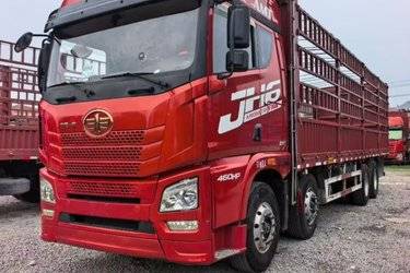 二手青岛解放 JH6重卡 领航版2.0 460马力 8X4 8.6米仓栅式载货车(国六) 前四后八 锡柴二手载货车 黄牌图片