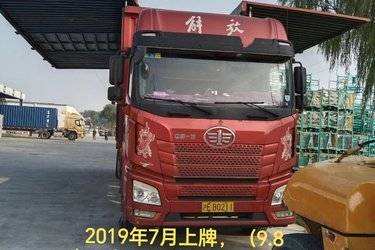 二手青岛解放 JH6重卡 领航版 290马力 6X2 9.5米翼开启厢式载货车(国五) 前四后四 锡柴二手载货车 黄牌
