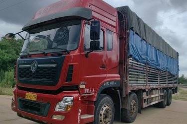 二手东风新疆 天龙KL燃气 380马力 8X4 9.4米LNG仓栅式载货车(国五) 前四后八 雷诺二手载货车 黄牌图片