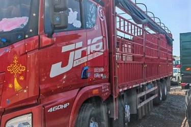 二手青岛解放 JH6重卡 460马力 8X4 9.4米仓栅式载货车(国五) 前四后八 潍柴二手载货车 黄牌