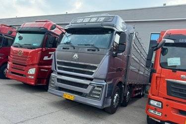二手中国重汽 HOWO TH7重卡 500马力 8X4 9.5米仓栅式载货车(国六) 前四后八 曼二手载货车 黄牌