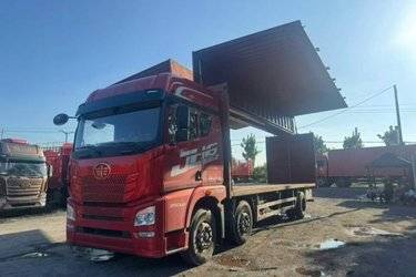 二手青岛解放 JH6重卡 350马力 8X4 9.5米仓栅式载货车底盘(国五) 前四后八 潍柴二手载货车 黄牌