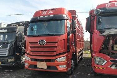 二手一汽解放 J6L 精英版 300马力 4X2 6.75米仓栅式载货车(国六) 单桥 锡柴二手载货车 黄牌图片
