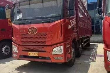 二手青岛解放 JH6重卡 290马力 6X2 9.4米仓栅式载货车(国五) 前四后四 锡柴二手载货车 黄牌