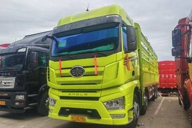 二手一汽解放 J7重卡 460马力 8X4 9.4米仓栅式载货车(国六) 前四后八 锡柴二手载货车 黄牌图片