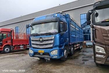 二手福田 欧曼EST 6系重卡 穿越版 460马力 8X4 9.45米仓栅式载货车(国五) 前四后八 福田康明斯二手载货车 黄牌图片