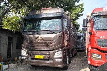二手青岛解放 JH6重卡 领航版2.0 420马力 8X4 9.5米仓栅式载货车(国五) 前四后八 锡柴二手载货车 黄牌