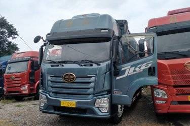 二手青岛解放 JK6中卡 290马力 4X2 6.75米AMT自动档仓栅式载货车(国六) 单桥 锡柴二手载货车 黄牌
