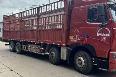 二手中国重汽 HOWO T7H重卡 460马力 8X4 9.5米仓栅式载货车(国五) 前四后八 曼二手载货车 黄牌