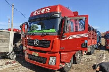 二手陕汽重卡 德龙X3000 430马力 8X4 9.55米仓栅式载货车(国五) 前四后八 潍柴二手载货车 黄牌