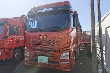 二手青岛解放 JH6重卡 领航版 400马力 8X4 9.5米仓栅式载货车(国五) 前四后八 潍柴二手载货车 黄牌