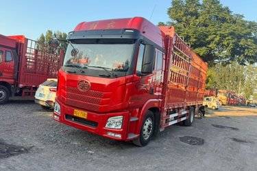 二手青岛解放 JH6重卡 320马力 4X2 6.75米AMT自动档仓栅式载货车(国六) 单桥 锡柴二手载货车 黄牌