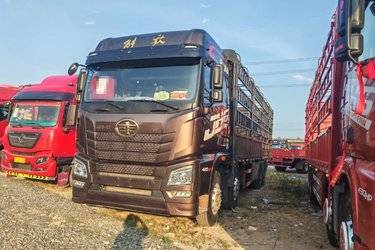 二手青岛解放 JH6重卡 420马力 8X4 9.4米仓栅式载货车(国五) 前四后八 锡柴二手载货车 黄牌